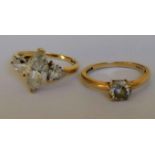 Two gold and cubic zirconia rings, hallmarked 14ct, sizes L, M, 4.5g (2)