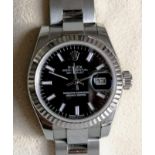 A Rolex ladies Oyster Perpetual Datejust wristwatch, black dial, 28mm with luminous baton hour