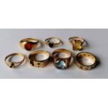 An assortment of seven 9ct gold rings, some gem-set, stamped and hallmarked, sizes J-P, 21g (7)