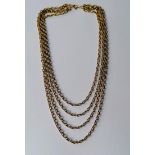 A graduated four-strand gold chain necklace with clasp, 42 cm, hallmarked 9ct, 35.46g