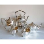 An Art Deco five-piece silver tea and coffee service with kettle on stand and burner: isometric