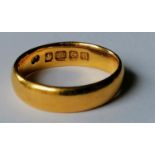 A 22ct gold wedding band, hallmarked, size, L, 5.95g