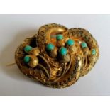 A Victorian gold and turquoise memorial brooch, dedication inscribed verso, 40mm x 50mm, not