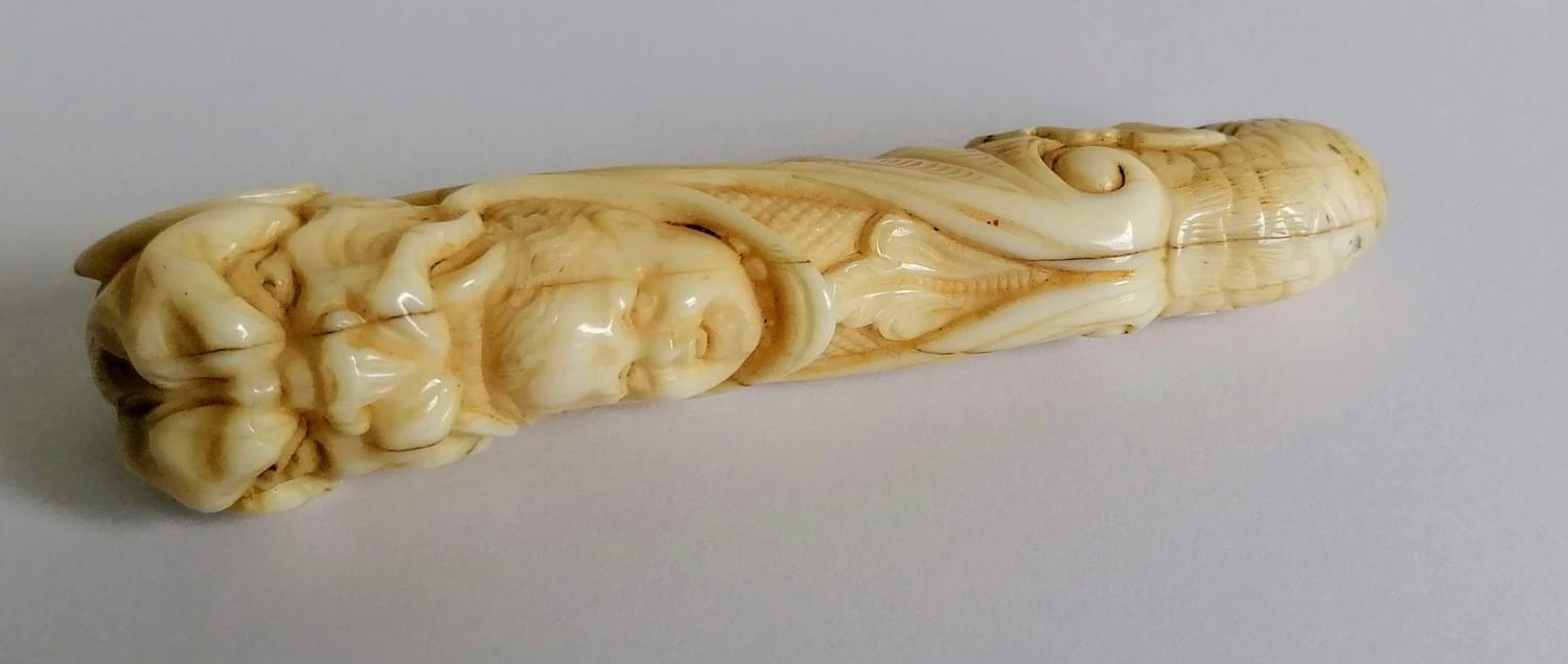 A 19th century carved ivory parasol handle