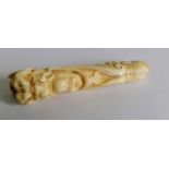 A 19th century carved ivory parasol handle