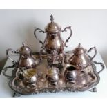 A 19th century seven-piece silver plated tea/coffee service with rococo and c-scroll decoration to
