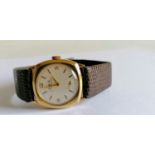 A 1960's H&G gold-cased manual watch with subsidiary seconds hand, stamped 9ct, dial 28mm, in