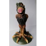 A Burslem stoneware grotesque bird ' The Accused', modelled by Andrew Hull on a circular base