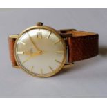 A vintage Omega automatic gents 9ct gold-cased wristwatch with date aperture, baton markers, dial