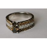 A diamond ring with a central yellowish brown diamond measuring approx. 5.93 x 4.99 x 3.2mm weighing