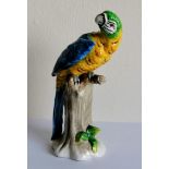 A Sitzendorf figurine of a parrot, 14 cm H, without visible damage or repair