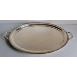 A George V silver two-handled oval butler's tray with gadrooned rim on pad feet, Birmingham, 1922,
