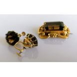 A Victorian smoky topaz brooch/pendant, the emerald-cut stone approximately 21mm x 15mm with c-