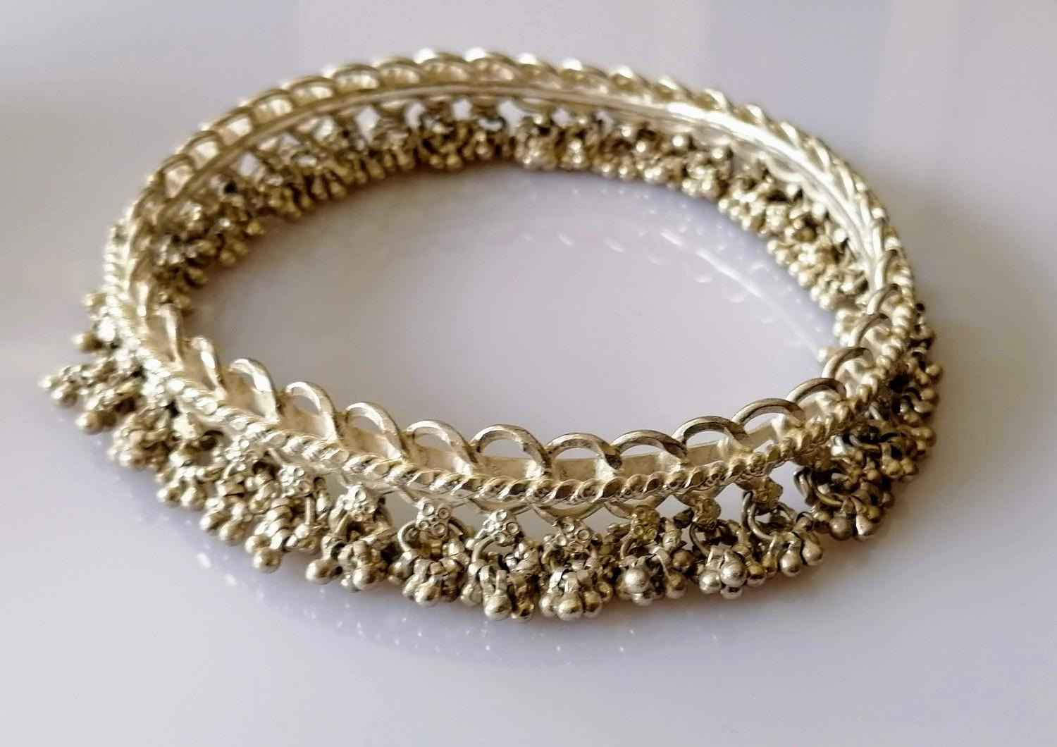 Two Indian silver anklets or bangles with tassels, each 10 cm diameter, 316g - Image 2 of 2