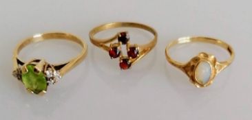Three gem-set rings on 9ct gold yellow gold, sizes O, N, M, 4.75g (3)