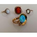 A yellow gold opal ring in the Grecian style, size P, stamped 9kt, 4.2g and three silver gem-set
