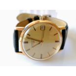 A vintage Longines manual gent's 9ct gold-cased watch with replacement strap, gilt dial 32mm,