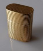 A Tiffany & Co. 14k yellow gold pill box with ribbed decoration, stamped, 30 x 25 x 13mm, 17.79g