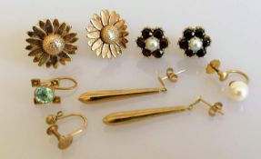 A pair of Clogau daisy stud earrings, a pair of pearl and garnet stud earrings, one other pair of