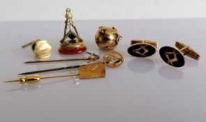A 9ct gold and silver gilt Masonic ball pendant folding to a crucifix; a pair of enamel cufflinks,