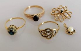 A sapphire cluster ring, size O; an oval garnet single stone ring and a yellow gold woven design