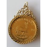 A mounted 1974 1oz Krugerrand gold coin, 39.72g