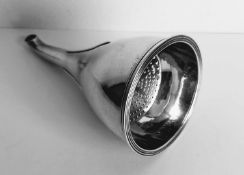 A George III silver wine funnel with ribbed support, removable strainer by Peter, Ann & William