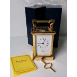 A David Peterson brass cased 8-day carriage clock with Roman numerals, as new with original