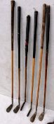 A mixed set of ten wood-shafted vintage golf clubs and putters by: Thistle Brand, Dunlop, JS