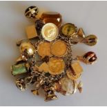 A 9ct yellow gold charm bracelet to include two gold half-sovereigns, 1895, 1914 and two full-