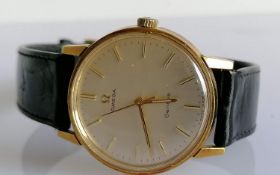 A vintage stainless steel Omega automatic Geneve Seamaster with champagne signed dial, 33mm, gold