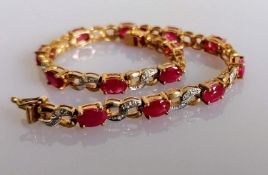 A garnet and diamond line or tennis bracelet on 9ct yellow gold, hallmarked, 18 cm, 8.55g