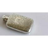 A late Victorian silver hip flask with seaweed etched decoration, filled cartouche, screw cap (