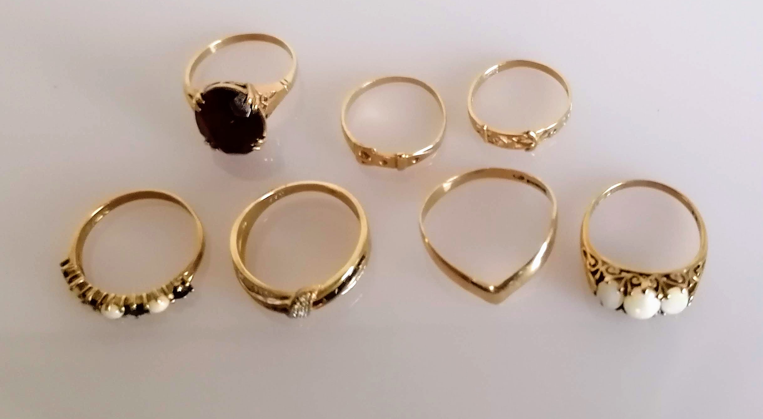 An assortment of seven yellow gold rings, some gem-set, all hallmarked or stamped 9ct, various sizes - Image 2 of 3