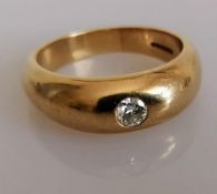 A 9ct yellow gold gypsy ring with brilliant-cut diamond, approximately 0.02 carats, size S, 7.04g