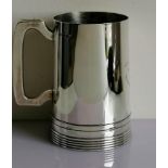 A mid-century silver tankard of plain form by Walker & Hall, Sheffield, 1950, 14 cm H, 415g with