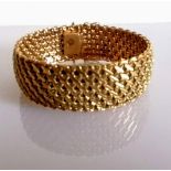 A 9ct yellow gold mesh bracelet, stamped, 48.08g