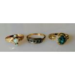Three gem-set, 9, 10 and 14ct gold rings, sizes L, M, O, stamped, 5.7g