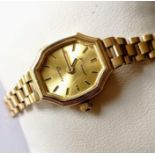 A mid-20th century ladies quartz dress watch with 9ct yellow gold strap and case by H. Samuel,