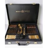 Two cased Solingen chrome nickel steel canteens of cutlery covered in 23/24 ct gold, settings for