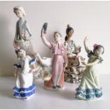 A group of five Lladro figurines to include a flamenco dancer, blue printed mark, 2170, 25.5cm; girl