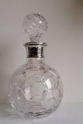 A contemporary cut-glass decanter with silver collar by Barker Ellis Silver Co., Birmingham, 2001,