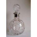 A contemporary cut-glass decanter with silver collar by Barker Ellis Silver Co., Birmingham, 2001,