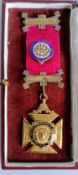 A Masonic cased 9ct gold and enamel Royal Antediluvian Order of Buffaloes medal awarded by the