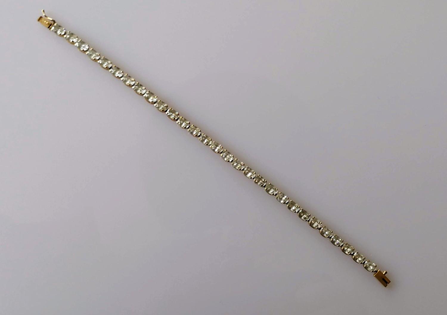 A 14ct yellow gold line or tennis bracelet with cubic zirconia decoration, box clasp, 20 cm, - Image 2 of 2