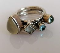 Wendy Ramshaw, C.B.E., R.D.I. (British, 1939-2018), a set of four silver stacking rings: