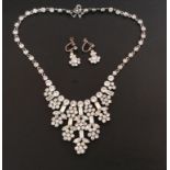 A Norman Hartnell (designer to the Queen) vintage diamante costume jewellery necklace and matching