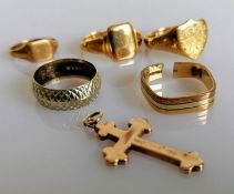 Three yellow gold signet rings, two mid-century rings and a crucifix, all hallmarked 9ct, various