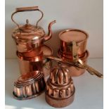 Two Victorian shaped copper jelly moulds, three graduated tin-lined copper pots with lids