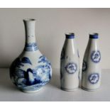 A 19th century white-ground Oriental bottle vase with allegorical scene in cobalt blue, double